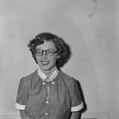 A woman wearing glasses