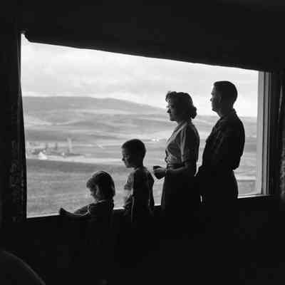 Family at window