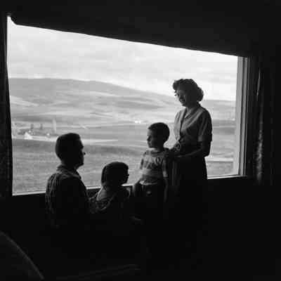 Family at window