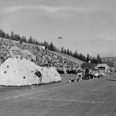 Parade floats in football field