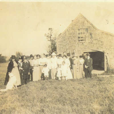 Family Group in Front of Barn