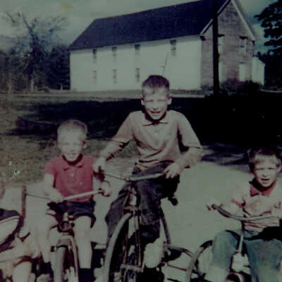 Morse kids, Belmont Grange in backgroung