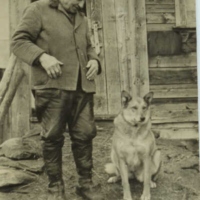 Unknown man with dog.