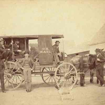 Freeman's stage: Ellis Freeman, driver and son Stanton Freeman standing by horses
