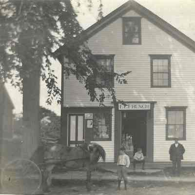 Fred E. French's store, established in 1912: The large stone at the entrance is today at the base of the Post Office flagpole. David Nichols identified it during construction of the P.O. and suggested it ought to be saved