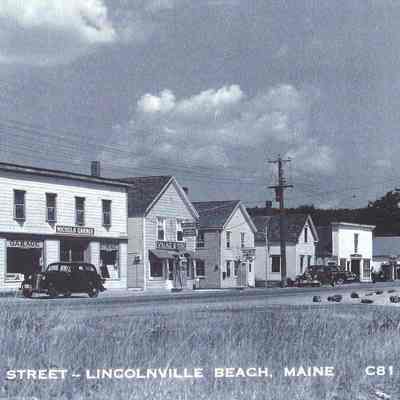 View of stores at Beach, c. 1930: Nichols Garage, Village Store, Post Office, Rankins Garage, Beach Inn
