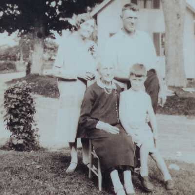 Lemira Miller, seated