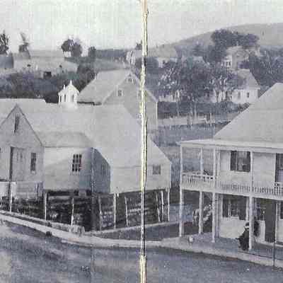 Early Beach buildings: Shows Frohock bridge and wharf, hotel and in background, Beach schoolhouse, Post Office (PO)