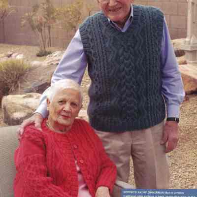 Cyrene & Frank Slegona modeling sweaters: from Interweave Knits, Summer 2007