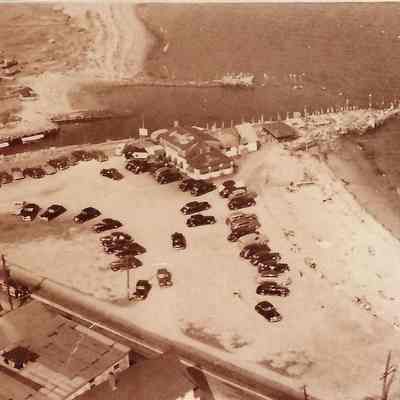 Wharves: aerial view of Beach: Shows remnants of kiln wharf, breakwater, and southern wharf