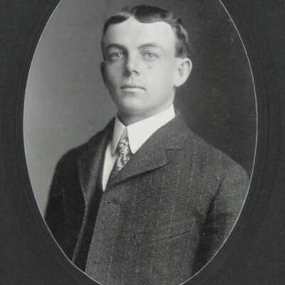 Bust Portrait male in coat and tie