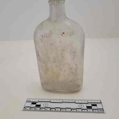 One pint clear glass bottle
