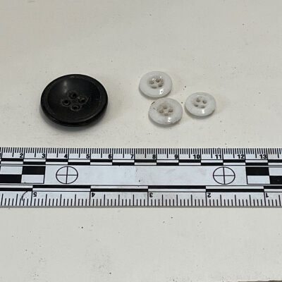 Black button, white porcelain buttons
