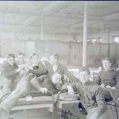 Group of men in barracks