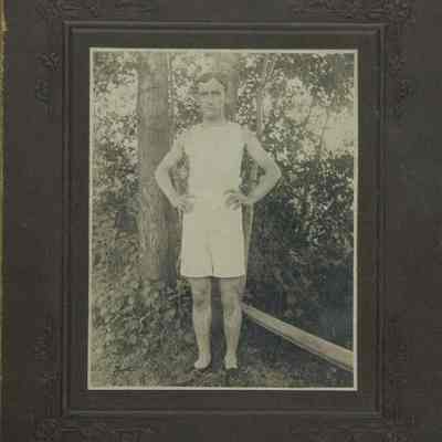 Standing male in exercise clothing