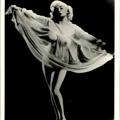 Photo - Patti Starr B&W, sheer nightie & pasties, wearing springolators