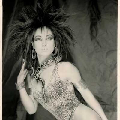 Photo - Trina Fynn, bodyshot with snake snake skin bodysuit