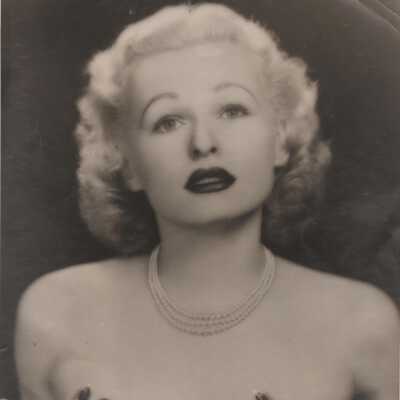 Photo - B+W- Hinda Wassau- Wearing 3 Strands of Pearls, Hands covering nipples, topless, Headshot