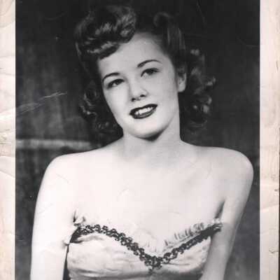 Photo - T-Nix written on back "Property of Dixie Evans" stamp B&W headshot