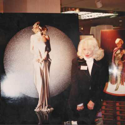Photo - Color- Dixie Evans- Print, Posing w/ art install mid-2000s