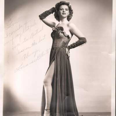 Photo - B+W- Lorraine Gilberte- gown &gauntlets, faded dedication + signature on front