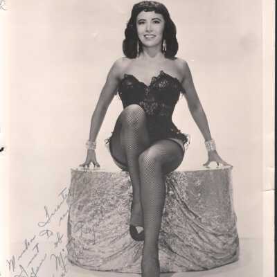 Photo - Mitzi Dore B&W, bustier & fishnets "The I Don't Care Girl"