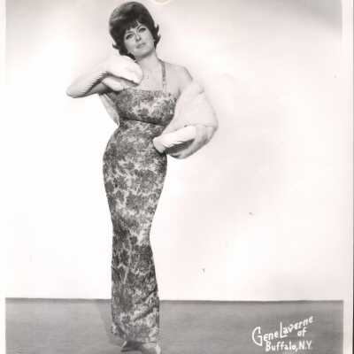 Photo - B+W-Sharon Jett- gown w/ floral motif w/ fur stole