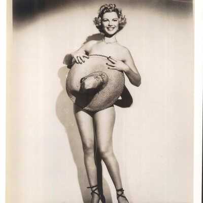 Photo - Gay Dawn, B&W: implied nude, holding sun hat in front of body