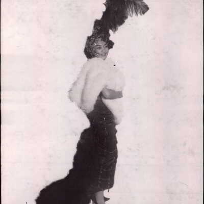 Photo - Lottie the Body, full gown, head dress, fur