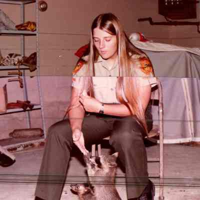 Ranger With Raccoons