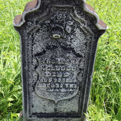 Rose on top of tombstone
