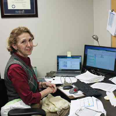 Ohio Geological Survey IMG_9165: May Sholes photographed in her office in Building B in Fountain Square, the Ohio Department of Natural Resources' central office complex in Columbus in February 2023.  
Photo and archived by Molly E. Hunt