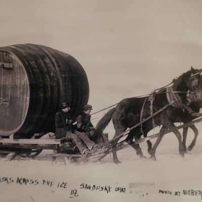 Photo of Wine Casks Being Transported Across the Ice