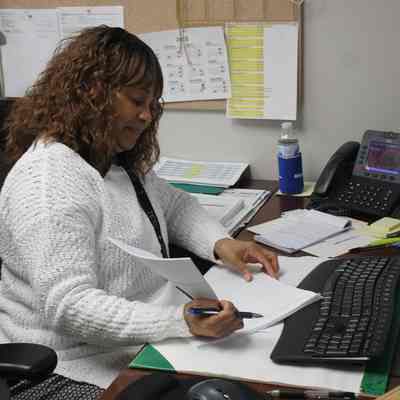 Ohio Geological Survey IMG_9169: Toni Rahaman photographed in her office in Building B in Fountain Square, the Ohio Department of Natural Resources' central office complex in Columbus in February 2023.  
Photo and archived by Molly E. Hunt