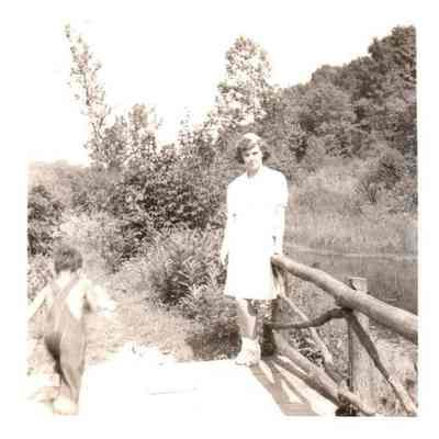Woman Posing By Creek