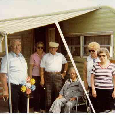 Photo of Adrian Mohler With Five Unidentified Folks in Front of a RV