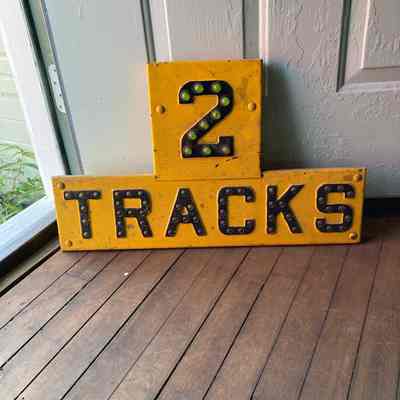 Sign for Crossing Buck where there are 2 tracks