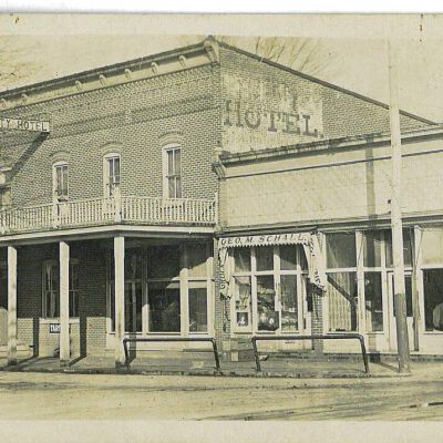 Postcard of Hotel, Bank, Grocery, and Barbershop in 1908