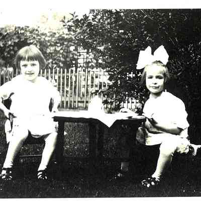 Photo of Two Unidentified Girls Having Tea in the Yard in the Mohler/Follett Family
