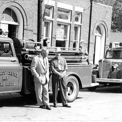 Photo of Liberty Center Fire Station and Trucks, circa 1960