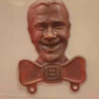 Joe E Brown Metal Pinback, loops to add other metal bars