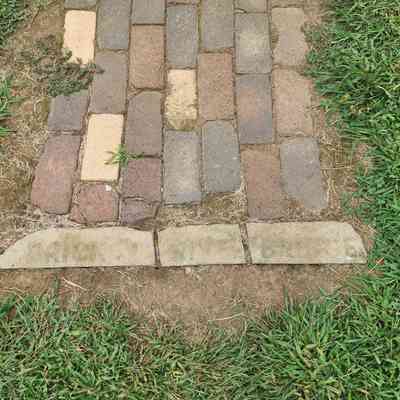 River Bridge Bricks at Pathway & Stack Behind Building