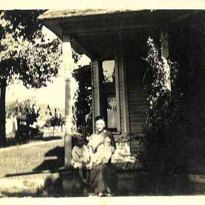 Photo of Unidentified Woman and Two Children on House Porch Steps from the Mohler/Follett Family
