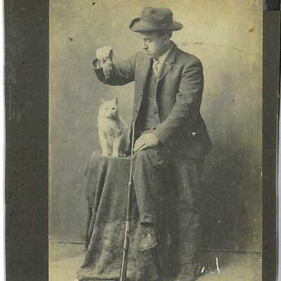 George W. Pennock with "Tail" the Cat