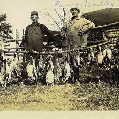 Photo of Henry Bradley and Unidentified Man With Their Duck Harvest