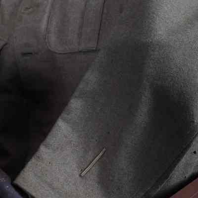 Machine Gun Corps Service Dress Jacket on display in the "Vickers Machine Gun" Exhibition - close up on Wound Stripe