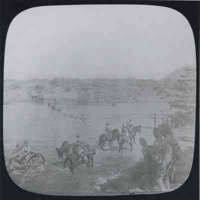 Photograph "Company of Royal Canadian Regiment crossing the Modder River, Paardeburg, Orange Free State, South Africa, 18th February 1900."