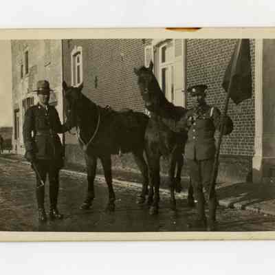 Postcard "A RPPC of a 4th Battalion Major and a flag bearer with their horses France."