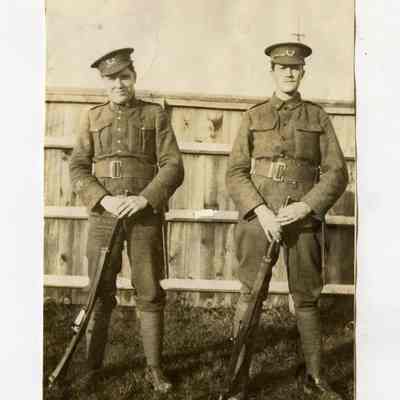 Photograph "Unidentified photograph of two 8th Battalion men with rifles."