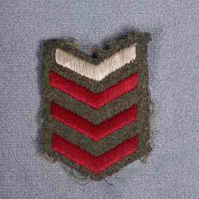 1939-1945 Canadian Army service stripes badge.